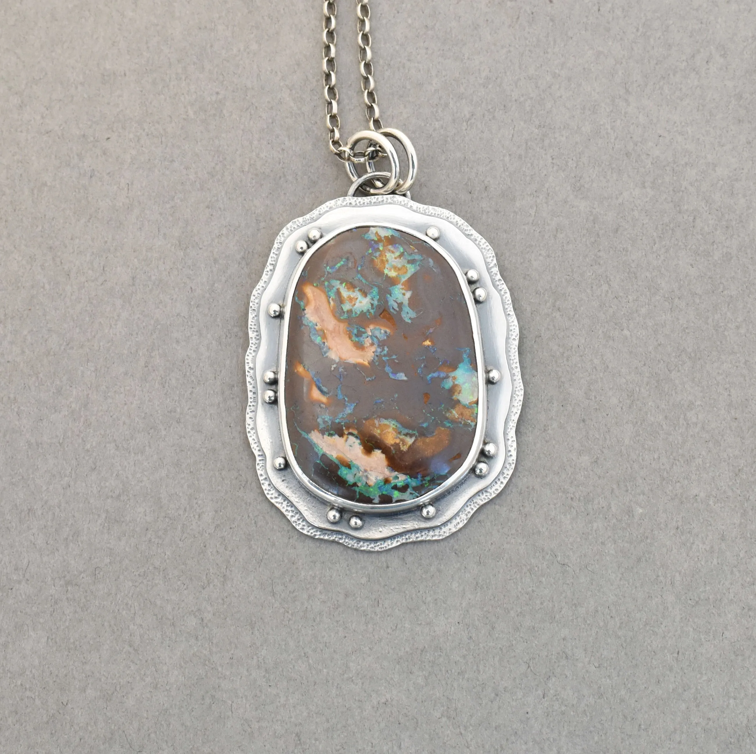 Boulder Opal Pendant. Layered Textured Bits of Light.