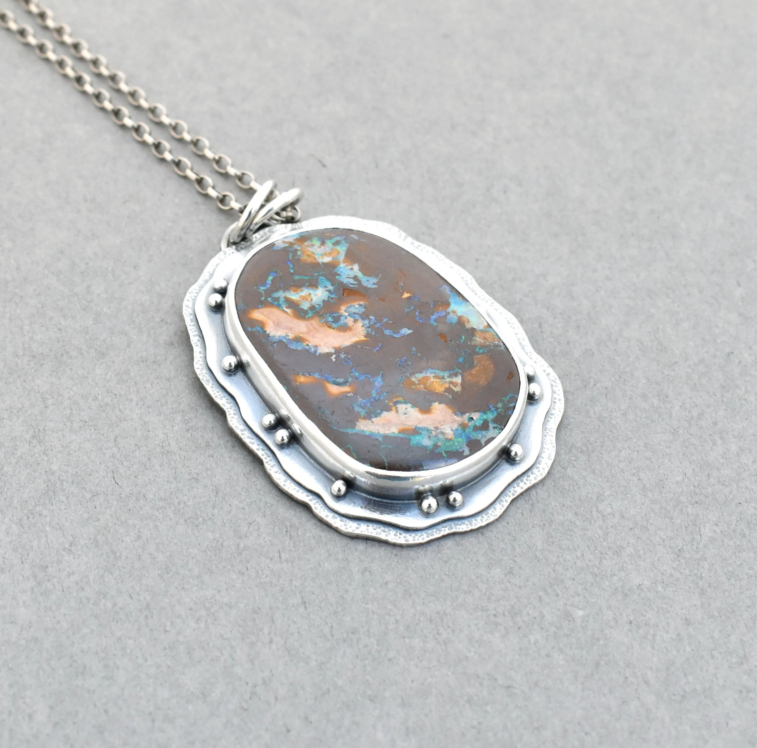 Boulder Opal Pendant. Layered Textured Bits of Light.