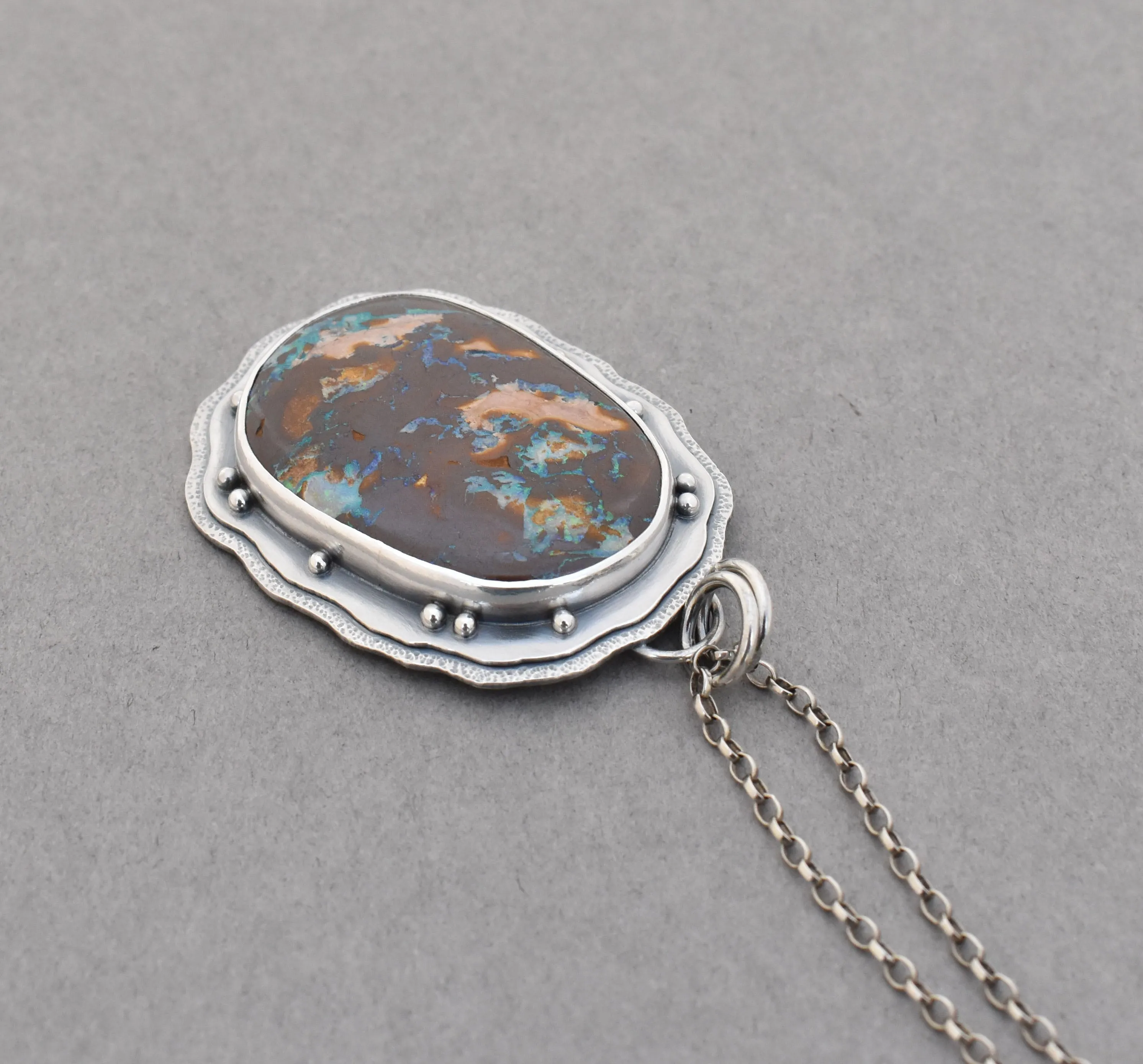 Boulder Opal Pendant. Layered Textured Bits of Light.