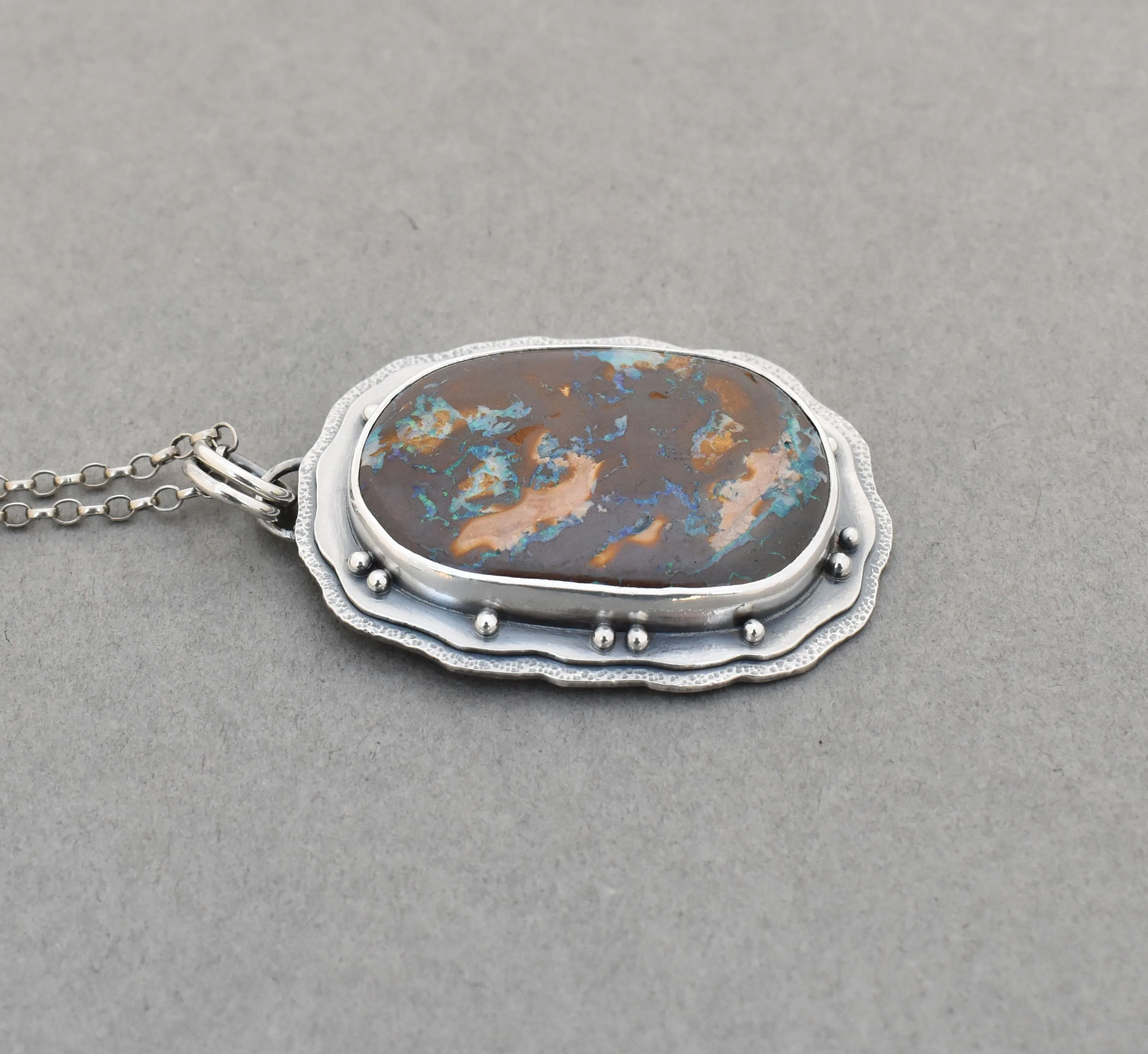 Boulder Opal Pendant. Layered Textured Bits of Light.