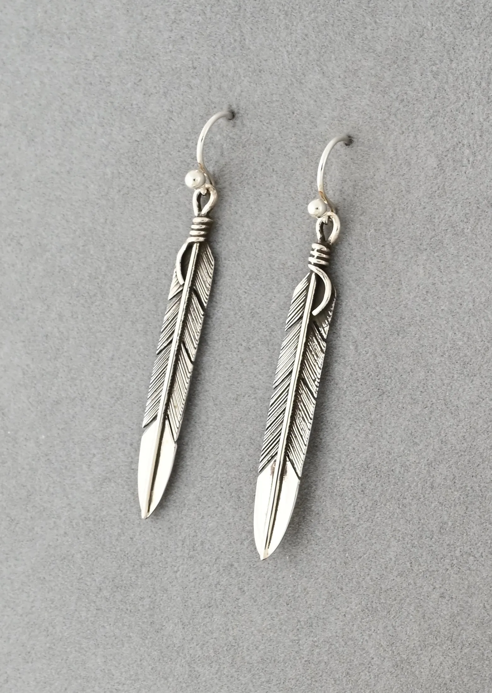 Feather Earrings by Raymond Coriz
