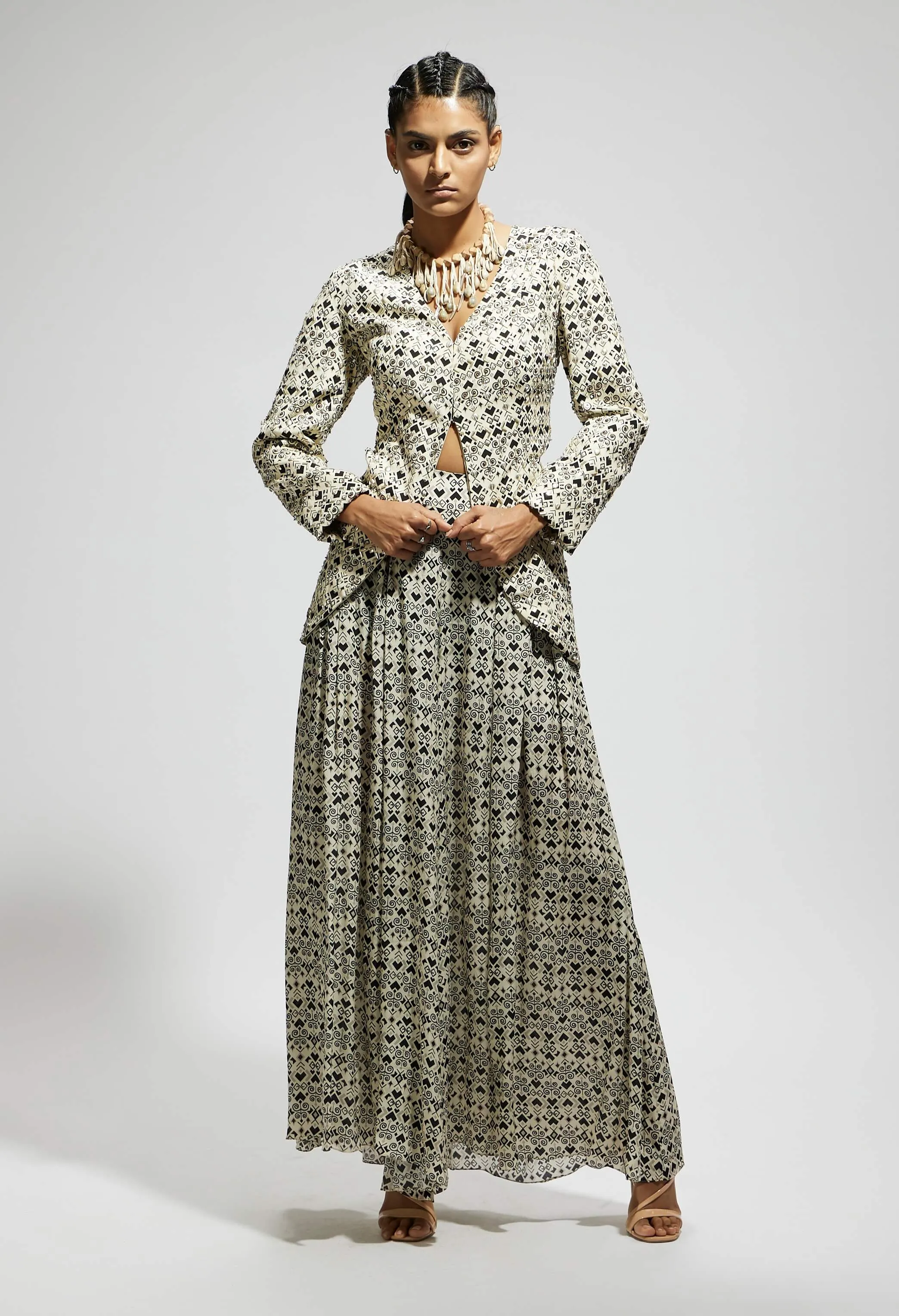 White embellished side cut out jacket and pants